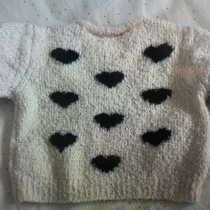 Charming Kids' Cream Sweater with Black Heart Design